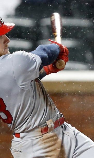 Cards rally in the ninth inning against Mets before rain suspends play